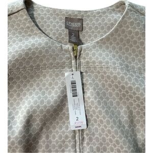 Chico’s size 2 (see size chart). More like a 12-14. Has pockets.